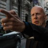 O ator Bruce Willis em cena da franquia de ação Duro de Matar (Reprodução)